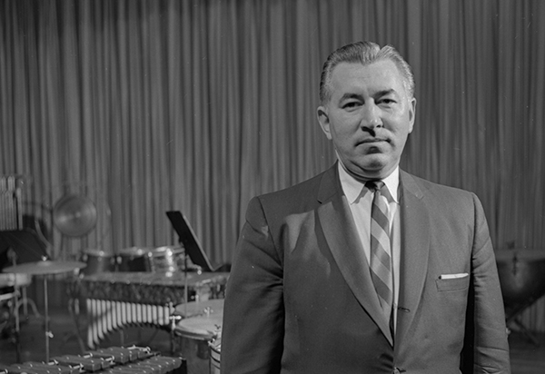 man in room with percussion instruments