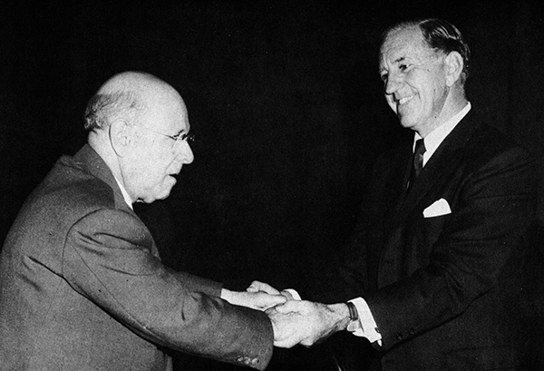 two men shaking hands