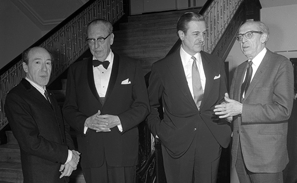 four men in suits