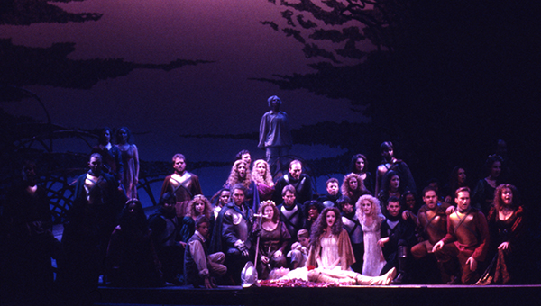 stage full of singers in an opera