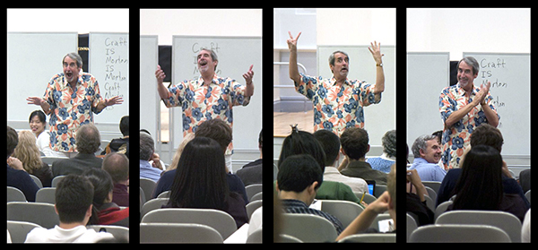 man teaching a lecture to class