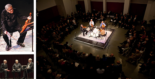 man with violin, string quartet surrounded by audience